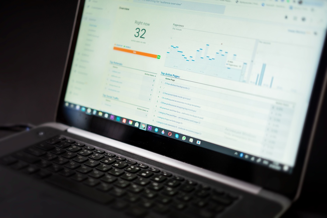 SaaS analytics dashboard on a laptop